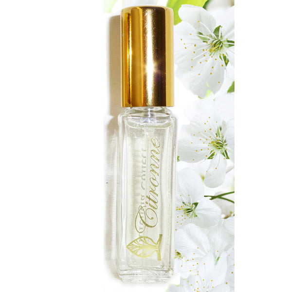 A small spray bottle of Citronné Fragrance in a clear bottle with gold top.