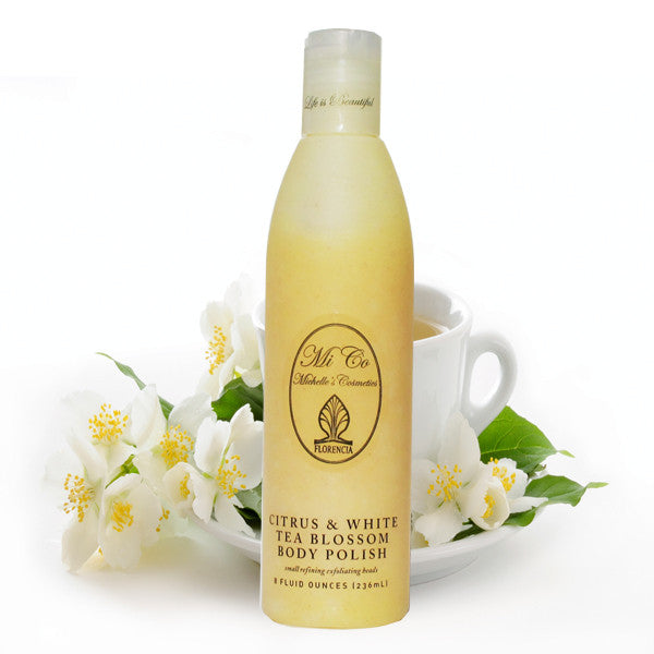 A bottle of Citrus & White Tea Blossom Body Polish