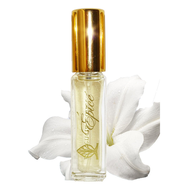 A bottle of Épicé Fragrance spray with a clear bottle and gold lid.