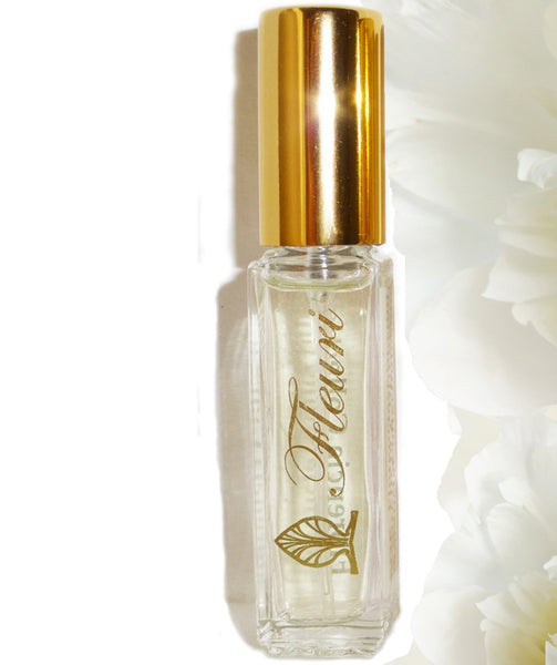 Fleuri Perfume bottle with a gold top.
