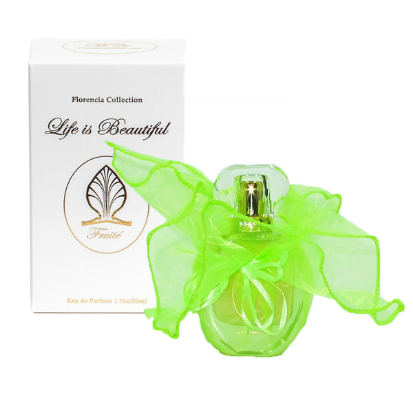 Fruité Perfume bottle wrapped up in a transparent green gift bag in front a perfume box.