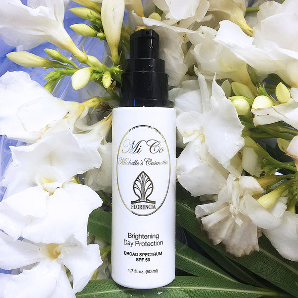 A bottle of SPF 50 Brightening Day Protection Broad Spectrum.
